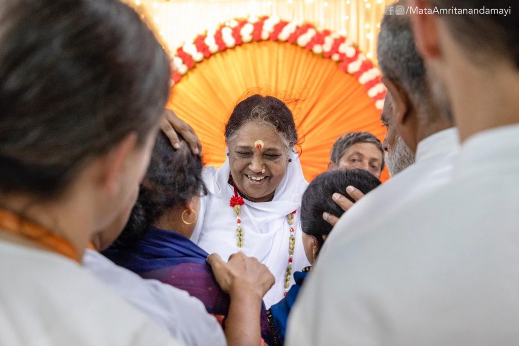 Amma meets people at the program