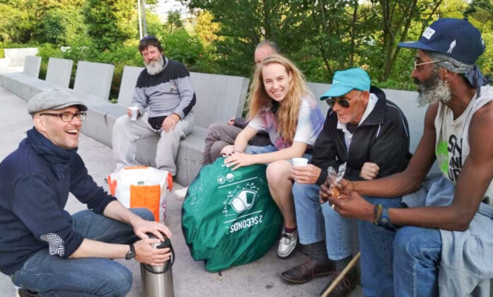 Volunteers-create-a-connection-by-listening-carefully-to-what-the-homeless-people-express..jpg