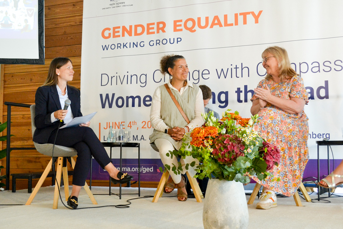 Alena Steffen, moderator, with Lucia Rijker, a world champion kickboxer and Hollywood actress from the Netherlands, and Corinna Witzel, a board member of UN Women Germany.