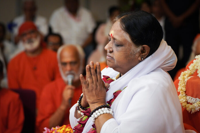 Amma expressed that Guru Pūrṇima is the celebration of a disciple attaining a state of completeness in thought and action.