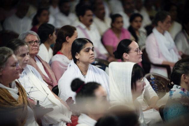 People from around the world were assembled in the Ashram's Bhajan Hall for the Guru Purnima programme.