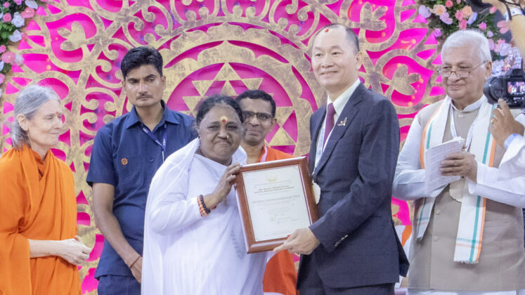 Amma received the esteemed 'World Leader for Peace and Security Award' in recognition of her significant contribution of bringing spirituality into the realm of technology discourse.